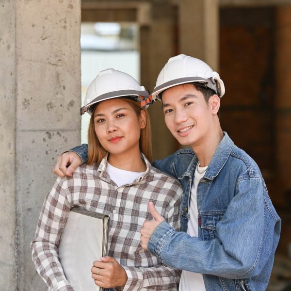 two-happy-investors-in-helmet-standing-at-construction-site-real-estate-investors-concept-1-1-1.jpg